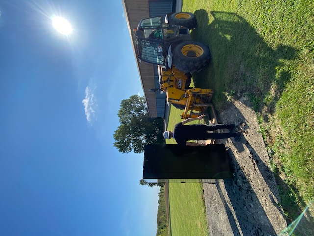 The M-BRIC energy-storage unit being positioned beside installation equipment